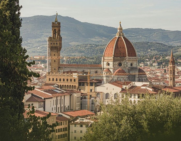 The Duomo and Palazzo Vecchio rising over Florence